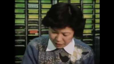 British TV presenter demonstrating how easy it was for a Russian spy to obtain a Z80 processor for nefarious purposes. Japan, 1984.