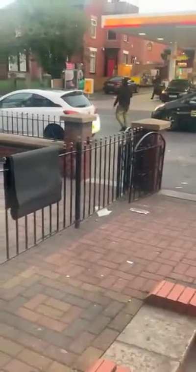 Two machete-wielding men get into an altercation with a car at petrol station in my home-town last night (Bolton, England). Doesn't seemingly end that well for one of them. (not my video)