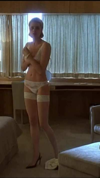 Rebecca Romijn's tight body in Femme Fatale