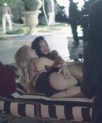 Rihanna coping a feel with Shakira.
