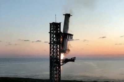 SpaceX catches Starship rocket booster in dramatic landing during fifth flight test