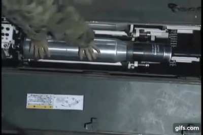 Reloading of a Japanese Type 90/Type 10 bustle autoloader ready rack