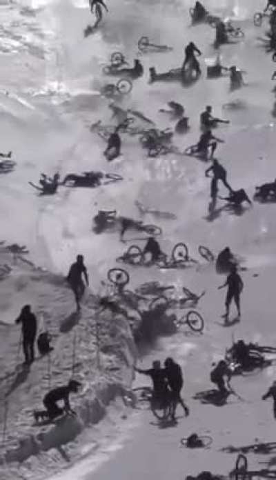 What could go wrong downhilling an icy track with 700+ mountain bikers at once?