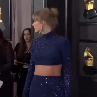 Taylor posing on the carpet