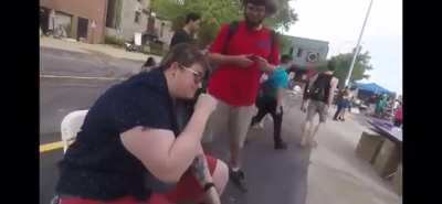 2 grown men harass and bully someone at a pride parade for basically no reason.