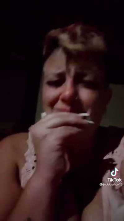 NSFW woman stabs someone. Immediately makes a tiktok video complete with transitions. Answers no questions and continues to post (non graphic)