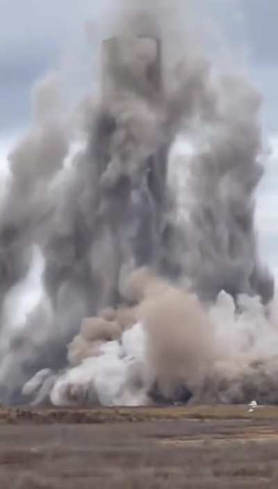 The demolition company was supposed to take down four chimneys and leave the fifth standing
