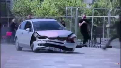 Albanian guy prevents possible terrorist attack with a drop kick through the window!