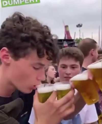 Guy downs four beers at once