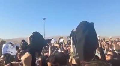 Women of Iran removing their hijabs while screaming "death to dictator" in protest against the assasination of a woman called Mahsa Amini because of not putting her hijab correctly