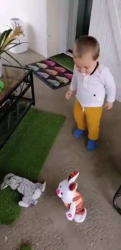 Kid playing with toys.