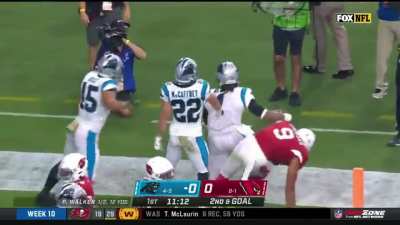 Cam Newton scores a touchdown&mdash;and screams "I'm back!"&mdash;in his return to the Carolina Panthers