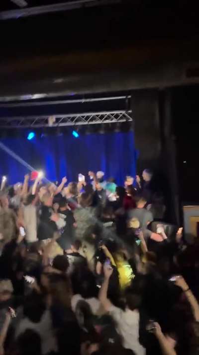 Fans on stage Carrboro show