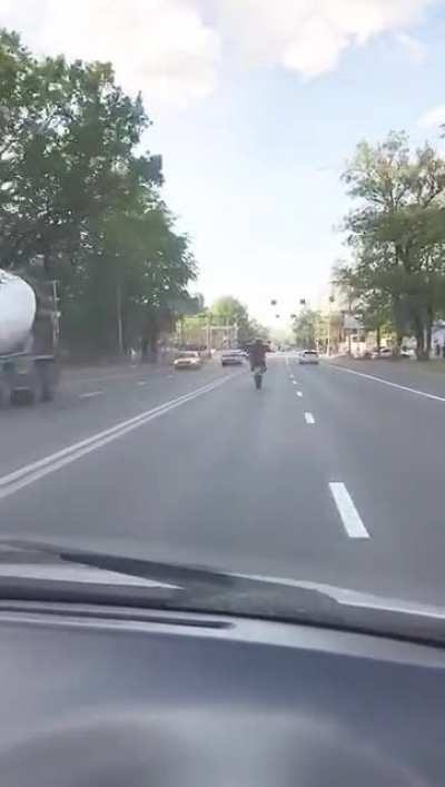 Doing stunts in traffic is NEVER a good idea