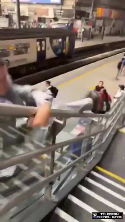 Showing off on a slippery handrail