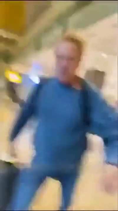YouTuber who "pranks" people by trying to steal their luggage at airports to get people's reactions (goes wrong)