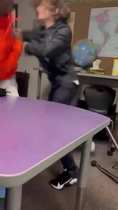 Attacking a kid with a notebook