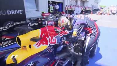 Seb Vettel petting his glorious RB9 at the N&uuml;rburgring in 2013