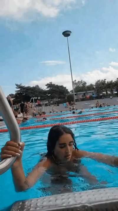 I wonder if she dives in or if she uses the stairs as how she leaves the pool