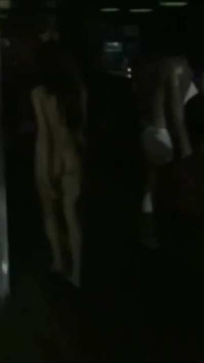 Naked beauties danced in front of a nightclub, and then they had a naked disco in the club