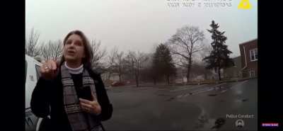 Karen attempts to prevent police from apprehending a domestic abuse suspect