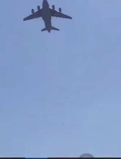 Insane footage of people falling off the side of military planes