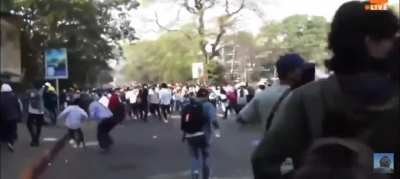 Military police in Myanmar fire live rounds at peaceful protestors.