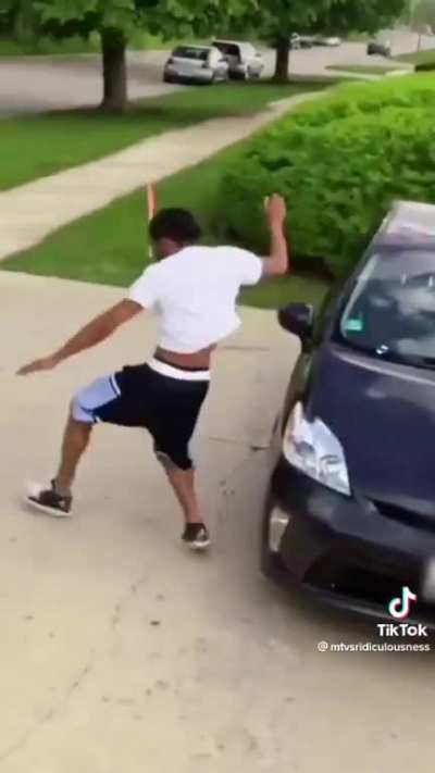 Guy does backflips over cars