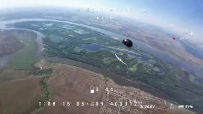 Ukrainian FPV kamikaze with a digital camera intercepts a Russian Takhion UAV that crashes in the de-occupied territory of the right-bank Kherson region. Mykolaivka village, Kherson region, July 2024