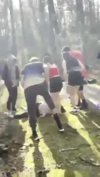 19 year old beats up 16 year old while his friends just stand there