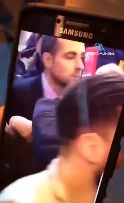 An egg is thrown at French President Emanuel Macron