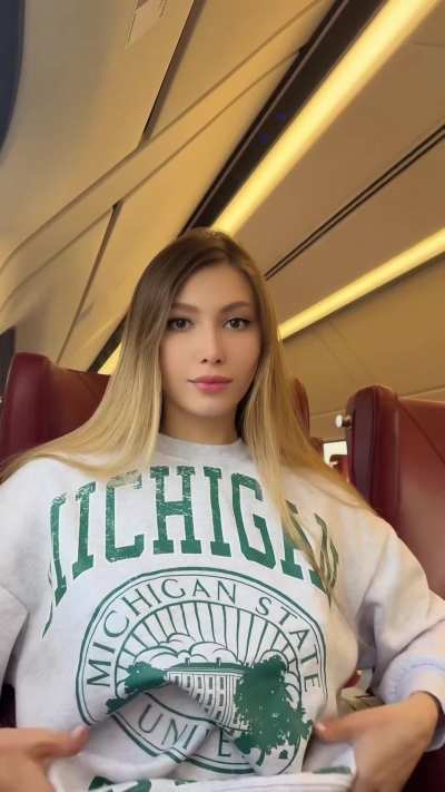 Revealing tits in the train