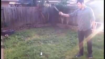 Throwing a knife at a spray paint can