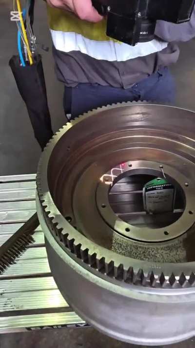 Removing corrosion from a cast steel component