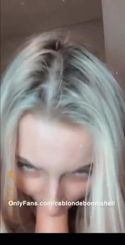 Sucking a dildo