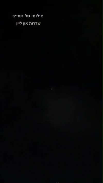 Iron Dome interceptors race across the skies of Sderot, Israel, destroying several incoming rockets from Gaza a few minutes ago