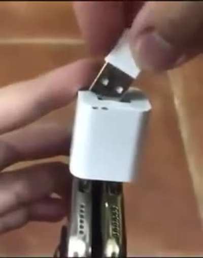Using a phone to charge two phones