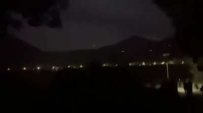 Anti-Junta Forces attacking a Myanmar Army position near the town of Pang Hseng, Northern Shan State. Filmed from the Chinese side of the border.