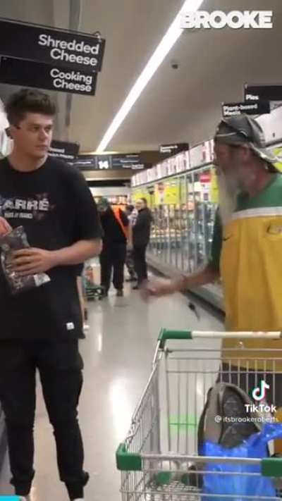 Prankster harassing a man just trying to do his shopping