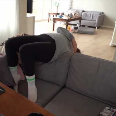 On the couch.