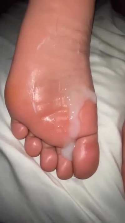 Letting a healthy ass nut marinate on my girls soles 