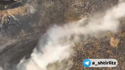 Russian assault on trenches goes bad, disembarked troops are immediately abandoned by their ride, and then subsequently gunned down by entrenched Ukrainian soldiers at close range.
 
