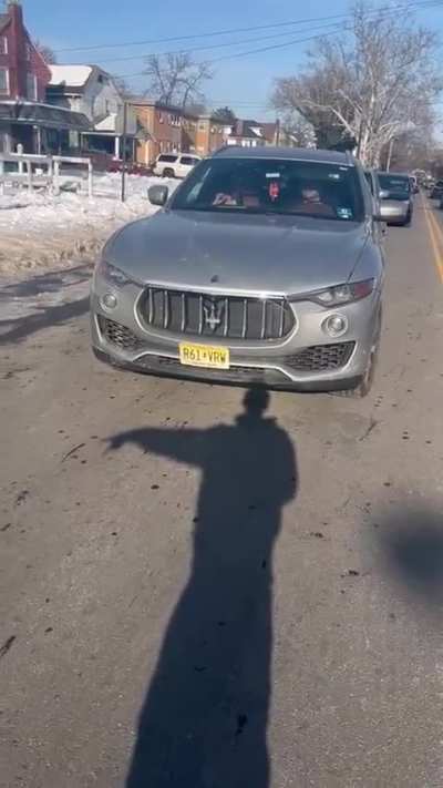 A guy let's his child drive and she hits a car