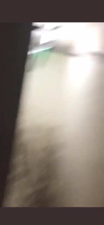 Door blasts open due to water pressure from Ivan.
