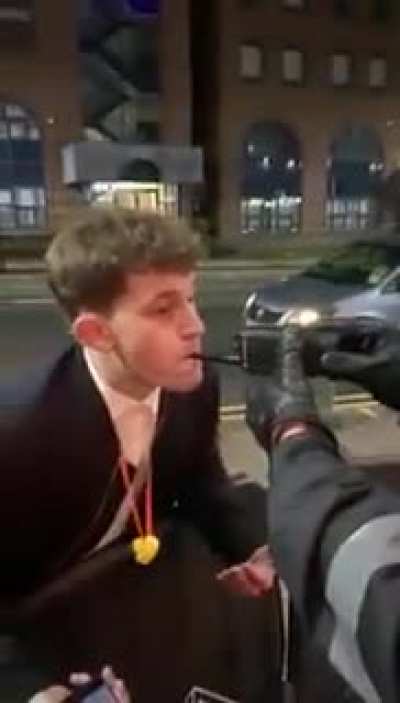 Guy blows into a radio thinking it&rsquo;s a breathalyzer