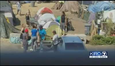 Group of homeless felons rob/attack couple with 2 year old in vehicle. Chaos ensues.