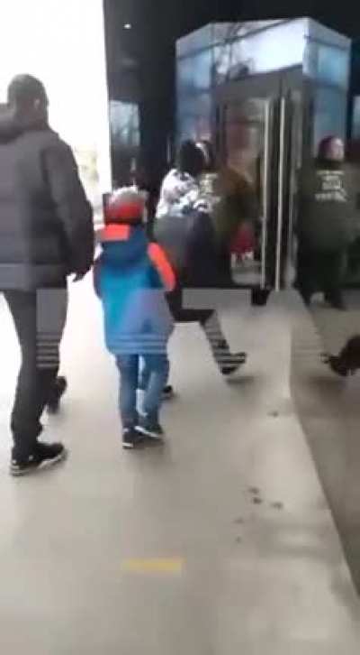 Russian handcuffed himself to the entrance of McDonald's and addresses Western countries... tells them they need to realize that the sanctions affect the lives of ordinary people. "Why must we give up our habits?