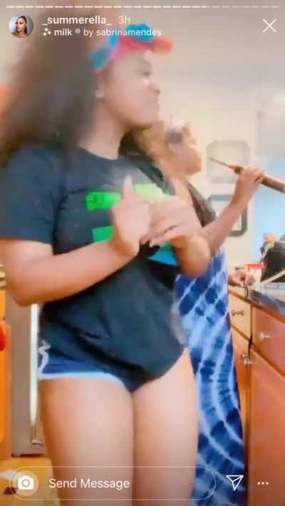 Showing off her lil cake