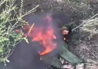 Russian soldier just chilling after being hit by something