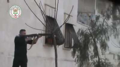 A FSA Division 16 rebel shoulder fires a MG3 (MG42 chambered for the 7.62&times;51mm NATO cartridge) at SAA forces. Aleppo 1/18/2014